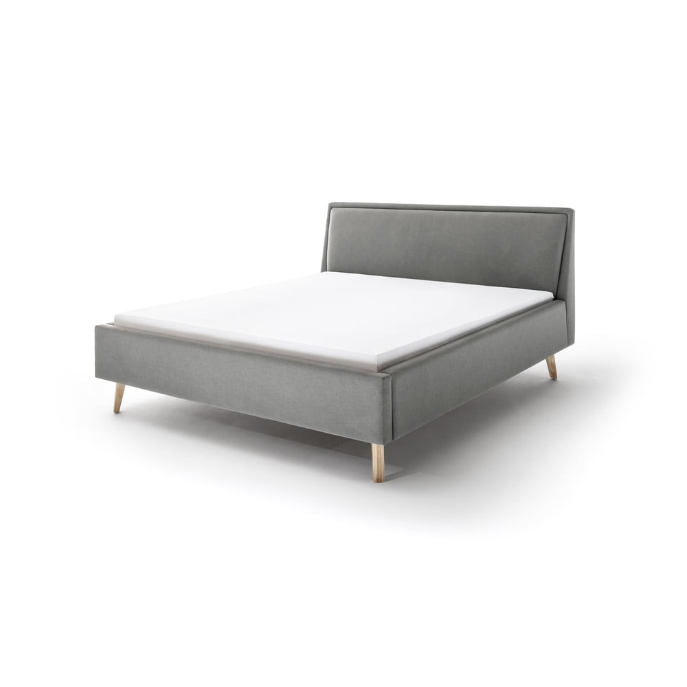 Svetlosivá čalúnená dvojlôžková posteľ s úložným priestorom s roštom 180x200 cm Frieda – Meise Möbel