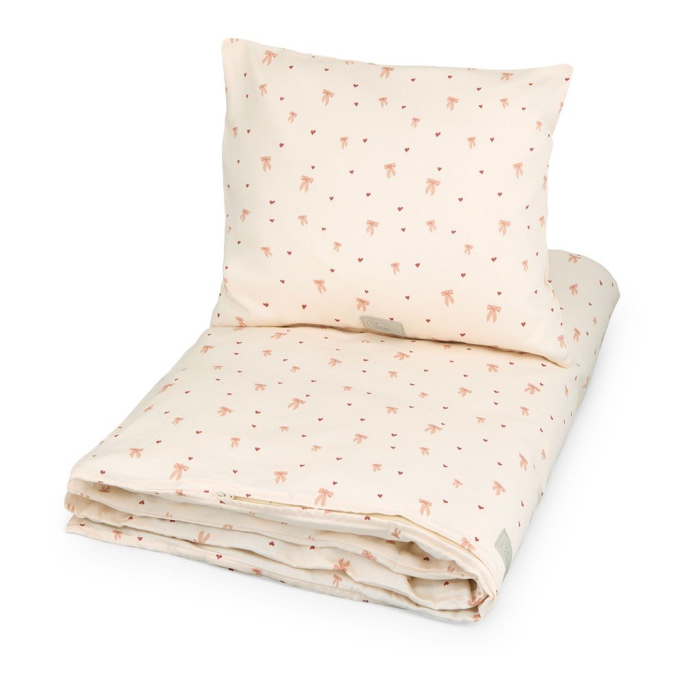 Svetložltá/ružová detská obliečka na jednolôžko z Bio bavlny 140x200 cm Bows – Cam Cam Copenhagen