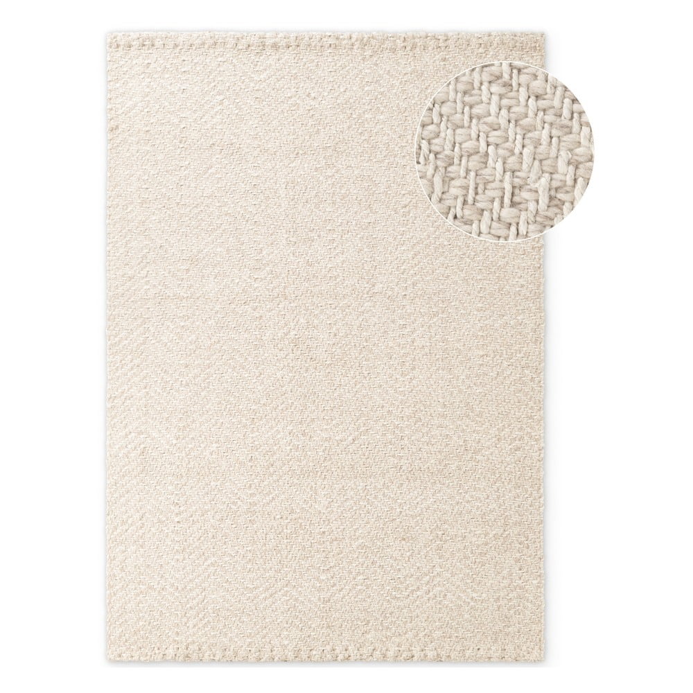 Krémový/slonovinový ručne tkaný koberec s prímesou vlny 160x230 cm Majoli – Elle Decoration